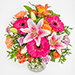 Geburtstagsblumen 5798 "Glanzleistung". Buntes, exotisches Bouquet in lebhaftem Orange und Pink mit Lilie, Nelken und Germini.