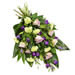 Begravningsblommor i vita och lila nyanser