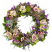 Trauerkranz bestellen bei Euroflorist. Modell WR14_001 "Lila Trauerkranz mit lila und violetten Blüten, unter anderem Rosen und Clematis.